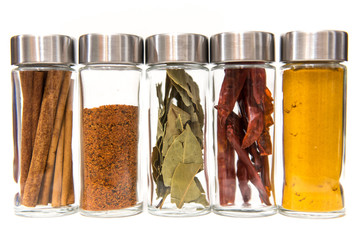 Isolated reusable spice jars on white background