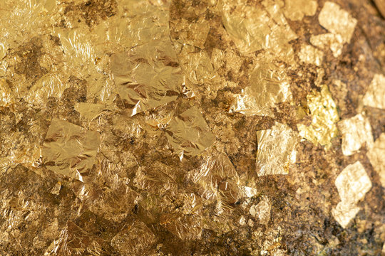 The gold leaf. For the background and textures with selective focus on blur background