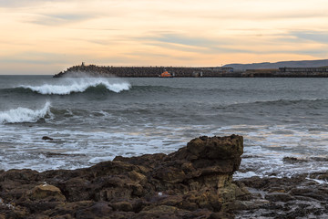 lifeboat sheltering from stormy sea