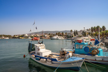 View of Kos harbor quay on sunny day