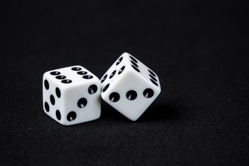 dices on black background