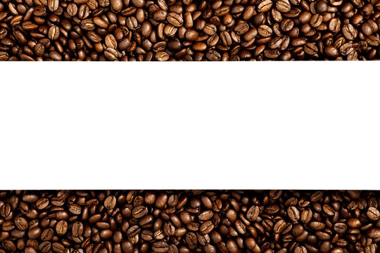 Coffee beans isolated on white background with space for text. Roasted coffee beans as background. Flat lay, top view, copy space © prime1001