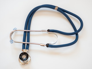Medical stethoscope on a white background
