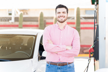 Fototapeta premium Happy Customer At Self-Service Gas Station