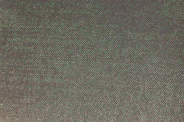 Abstract background texture of black tulle, shiny. Beautiful frill