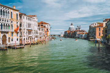 Fototapeta na wymiar Venice, Italy. Beautiful view of Grand Canal and Basilica Santa Maria della Salute at sunny spring day