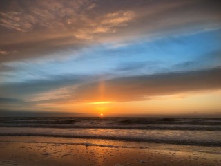 Naklejka na ściany i meble Sunset at the beach Julianadorp Netherlands. Coast Northsea. 