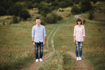 Loving young couple is having fun outdoors. Love and tenderness, dating, romance, family concept. selective focus.