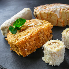 cakes different types (delicious dessert, assorted) menu concept. background. top view. copy save