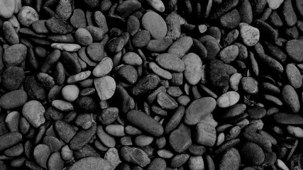 black pebble beach stone background