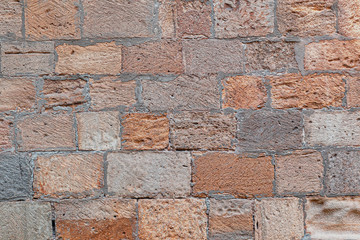 Wall of hewn stone blocks, background image