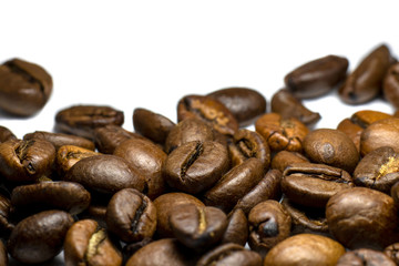 Coffee beans background, roasted coffee beans on a white background, space for text.