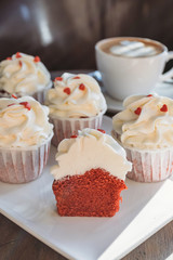 Cupcakes with hearts, coffee shop, romantic meeting for St. Valentine.