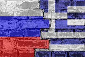 Russia Federation and Greece - National flags on Brick wall. Governments relations and conflict concept.