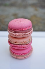 Colorful round macaron cookies on a platter