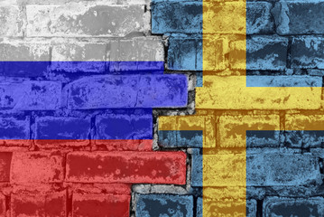 Russia Federation and Sweden - National flags on Brick wall. Governments relations and conflict concept.