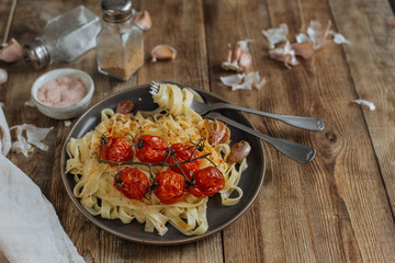 Freshly prepared pasta with cherry tomatoes