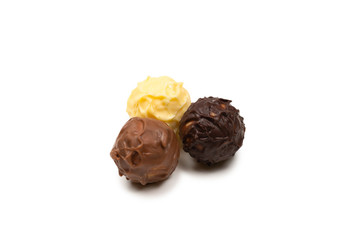Chocolate truffle isolated on white background.