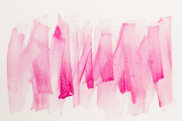 Abstract pink watercolor on white background.The color splashing in the paper.It is a hand drawn.