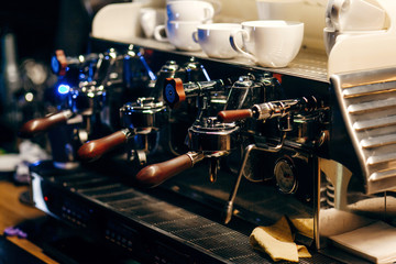 Fototapeta na wymiar Coffee macine in coffee shop, close-up