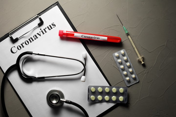 coronavirus concept. Test tube blood, pills, medical stendoscope