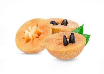 sapodilla fruit with green leaves isolated on the white background