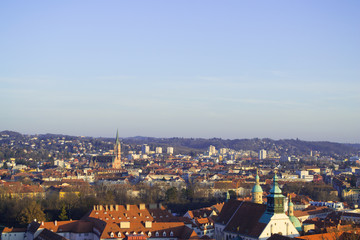 Fototapeta na wymiar Panorama from a height. Sunset in the city of Graz, Austria.