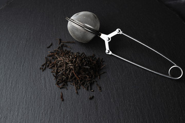 dried black tea leaves ready to brew