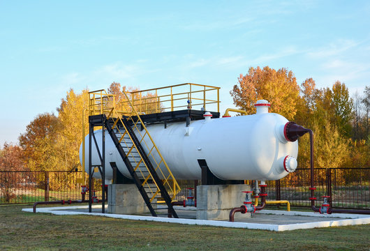 Separator At Oilfield Production Facility, Separating Oil And Gas From The Well Streams. Crude Oil Metering Station And Pipeline At Power Plant. Gas Separation, Analyser, Control And Sampling System