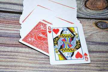 playing cards on wooden background