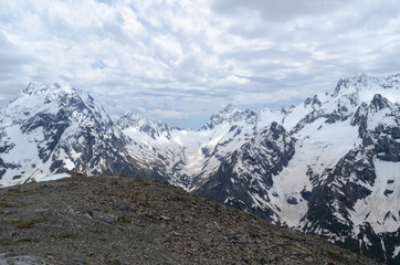 Harsh snow-capped mountains of the Caucasian ridge