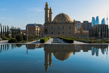 Tezepir mosque in Baku city with reflection in the water