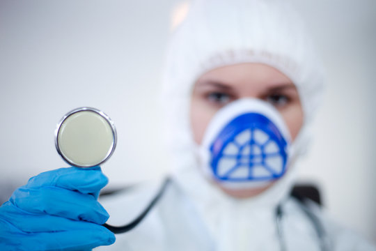 2019-nCoV- Hospital doctor takes blood samples and analyzes dangerous virus.Concept-Coronavirus.-Image