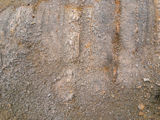 Rocky soil of the highlands of the North Caucasus with stripes of rock. Background image.
