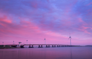 Fototapeta na wymiar Sunrise at Ketelmeer Netherlands. Bridge. Zuiderzee. Ketelbrug.