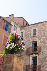 narbonne stone house ancient architecture with flower in city France