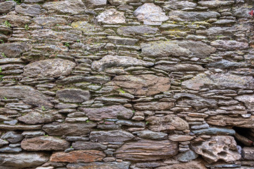Vintage white beige color stone wall background and texture