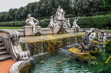 Fototapeta na wymiar The palace and park ensemble of Caserta amazes on a grand scale and is the last such creation in the history of Europe. The huge park, despite the cascade of ponds, depresses with its monotony. 
