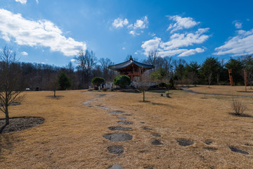 Fototapeta na wymiar Traditional Korean Pavillion on Open Field