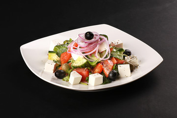 fresh salad with feta cheese and olives