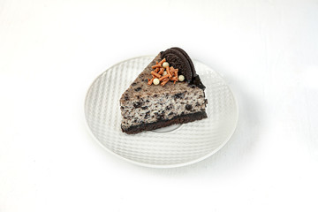 Cookies and cream brownies with topping made from Oreo cookies
