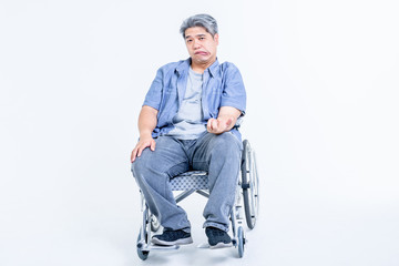Portrait images, Asian middle aged man sitting on a wheelchair His hands are kinking due to a nervous system illness and paralysis or Hemiplegia, On white background to health care concept.