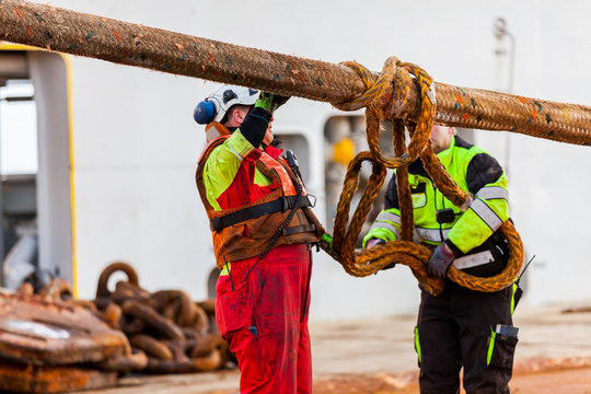 NORTH SEA, NORWAY - 2015 JANUARY 19. Anchor handling operation. Connect surface buoy to the polyester rope mooring system to the oil rig.