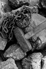 Rusty chain on the brickwork. The symbol of slave labor