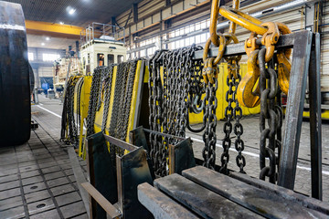 Chain for the crane on the rack, cargo slings for lifting goods.