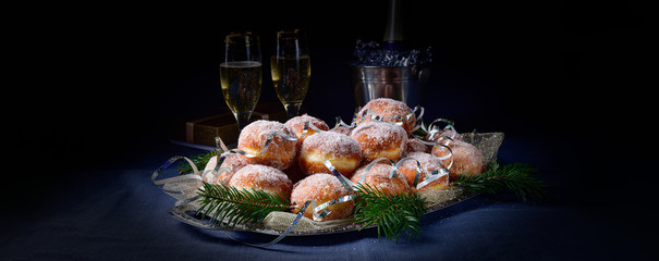 Fine Berlin donuts with jam filling and icing