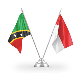 Indonesia and Saint Kitts and Nevis table flags isolated on white 3D rendering