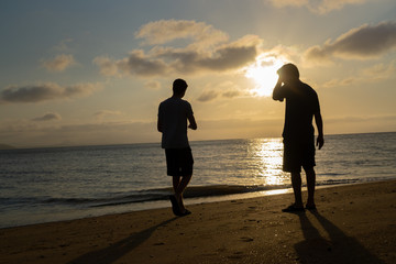 Friends at the beach for sunset