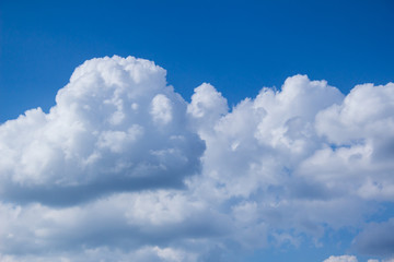 Naklejka na ściany i meble Huge and very beautiful clouds against the blue sky