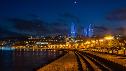 Night view of Baku with the Flame Towers skyscrapers